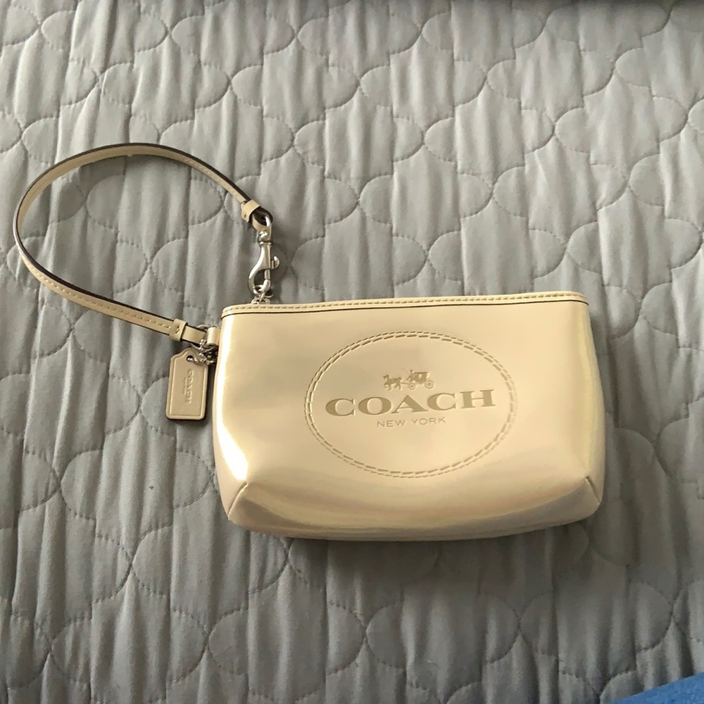 Shimmery Beige Coach Wristlet